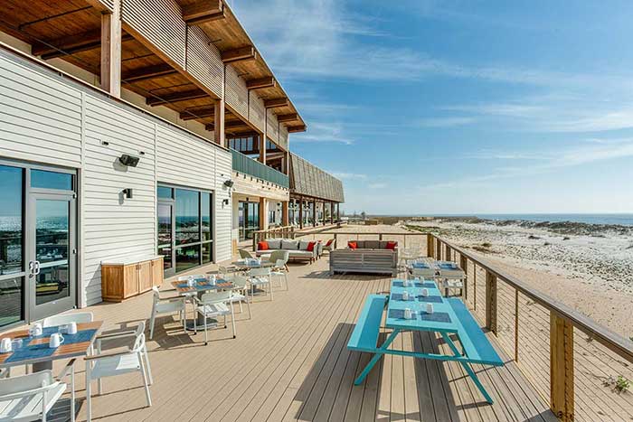 exterior deck of Foodcraft with blue picnic table