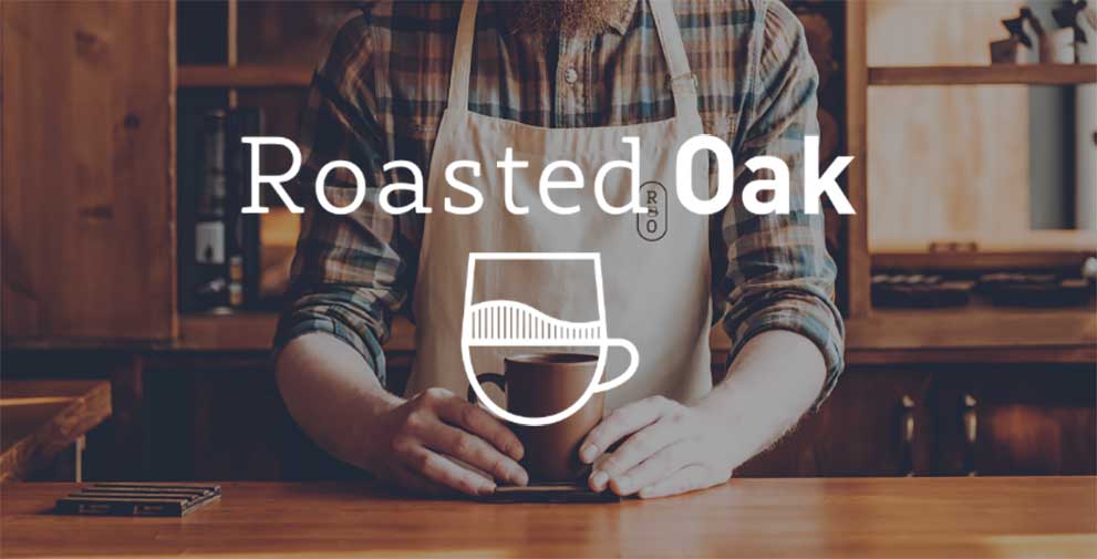 barista with apron holding a coffee cup with Roasted Oak logo superimposed on top